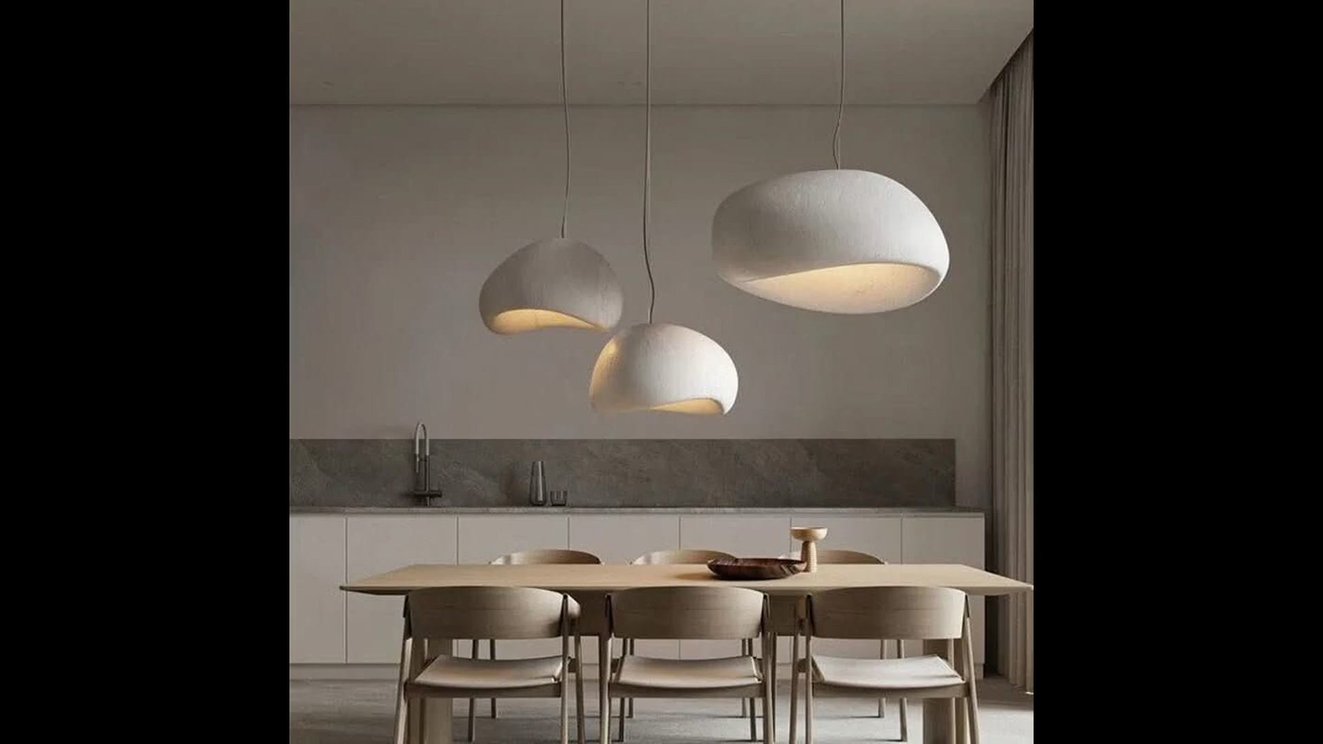 Cloud Pendant Chandelier installed in a styled living room