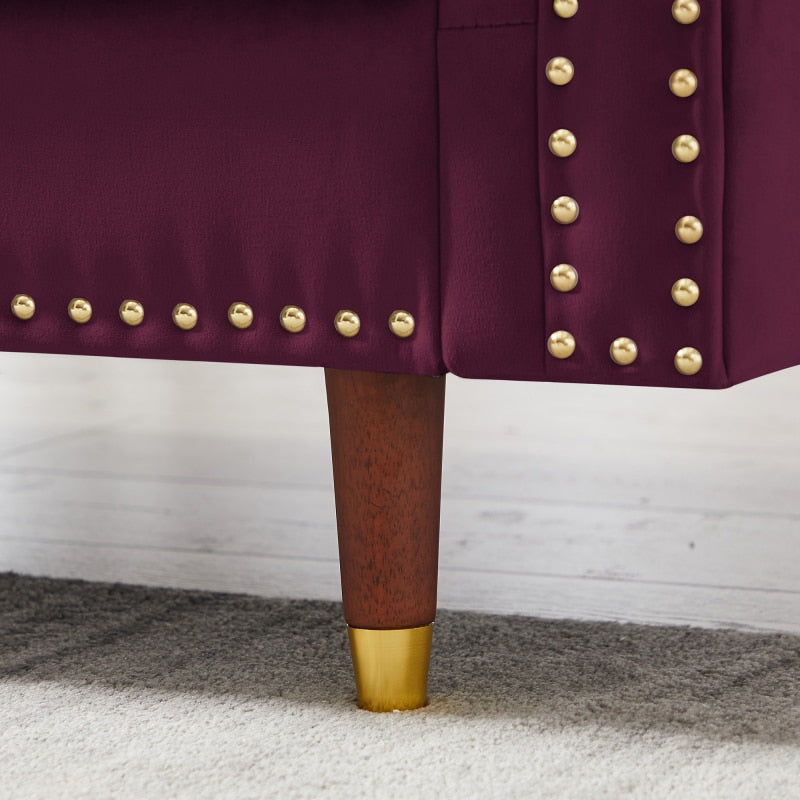 Burgundy Velvet Sofa Couch - hausgem - close up view of wooden legs with gold hardware