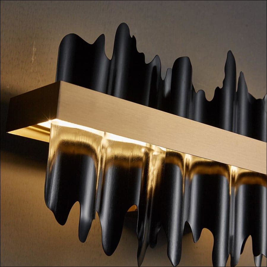Black and Gold lava shape LED Wall Light - hausgem - close up