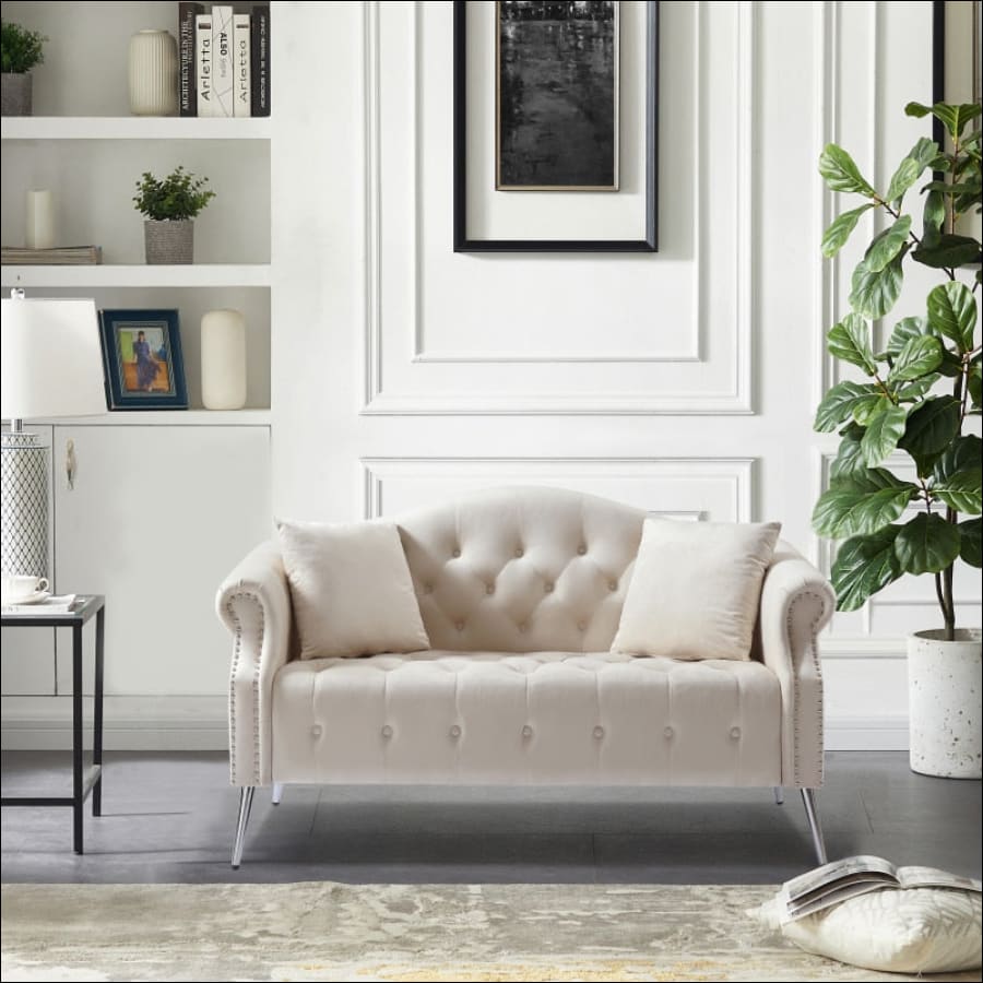 Cream Chesterfield Couch Loveseat with Trimmed Curved - scrolled arms - tufted couch with silver hardware - hausgem - united states